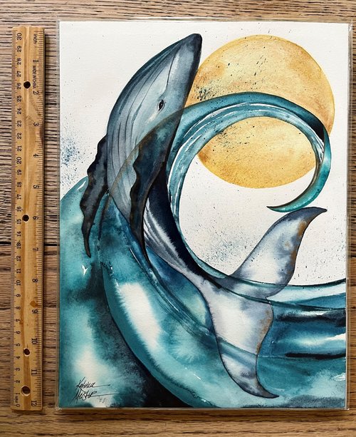 watercolor painting of whale and wave next to ruler for size reference