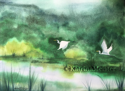 watercolor of lush green landscape with two white egrets flying over water