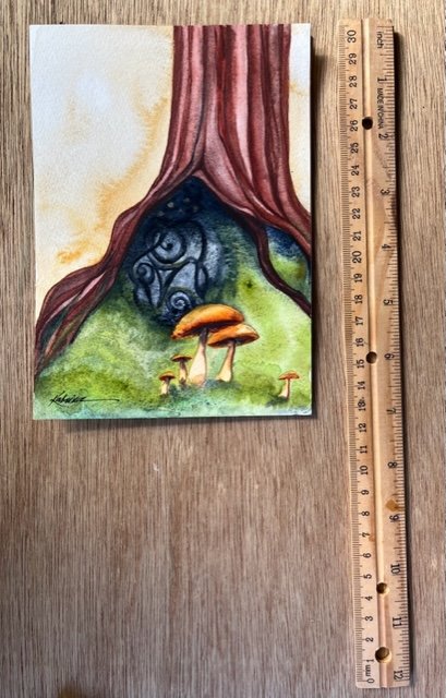 watercolor of a Celtic Stone and tree with ruler for size reference