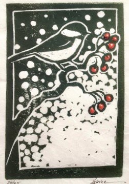 block print art of chickadee on red berry branch with snow
