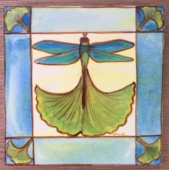 stylized watercolor of dragonfly with ginkgo leaves