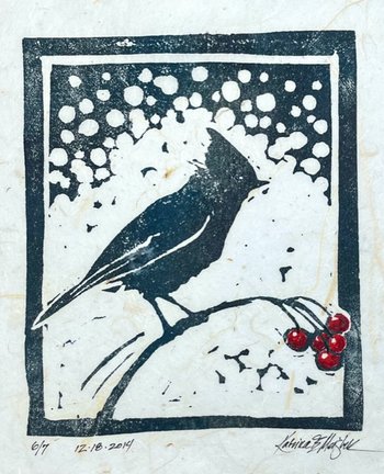 block print of songbird  on berry branch with snow
