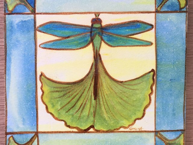 stylized watercolor of dragonfly with ginkgo leaves